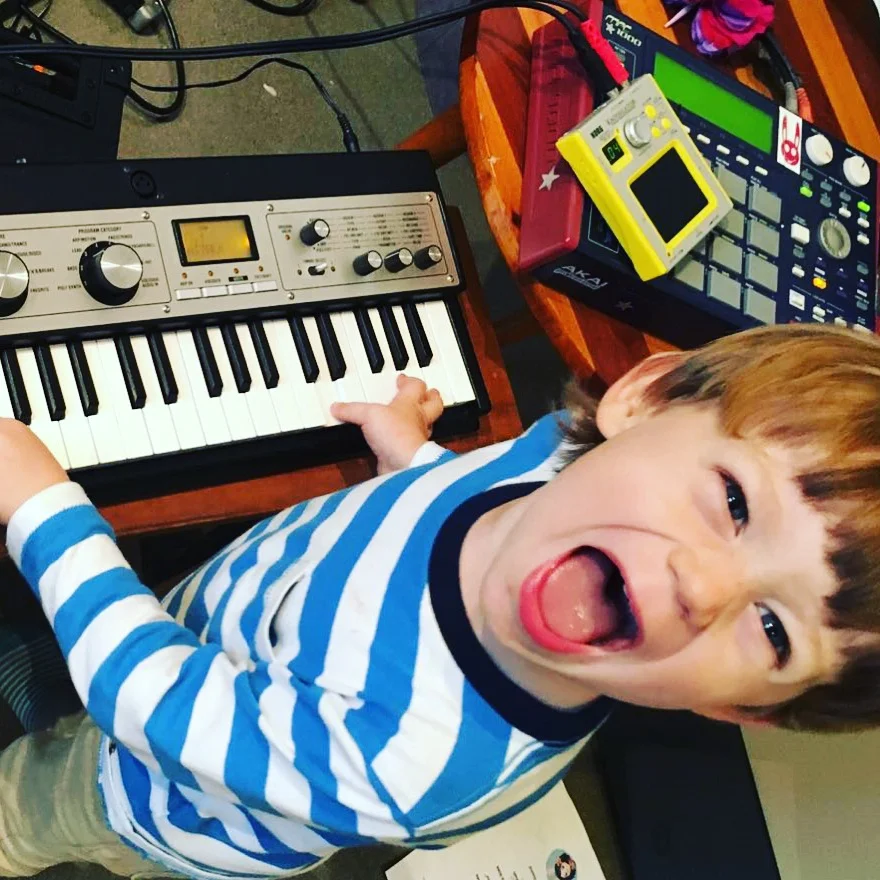 Happiness. when a 3 years old discovers the magic of electronic music.