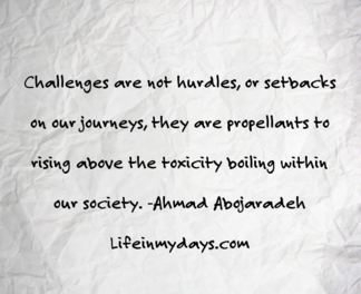 Image Description: A wrinkled piece of paper with the words "Challenges are not hurdles, or setbacks on our journey, they are propellants to rising above the toxicity boiling within our society. - Ahmad Abojaradeh Lifeinmydays.com