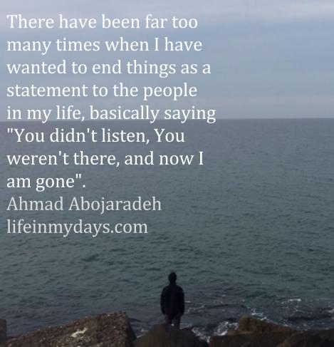 Photo description, a man, dressed in black and grey looks out at the horizon between the murky waters of the Black Sea, and a light grey sky. 