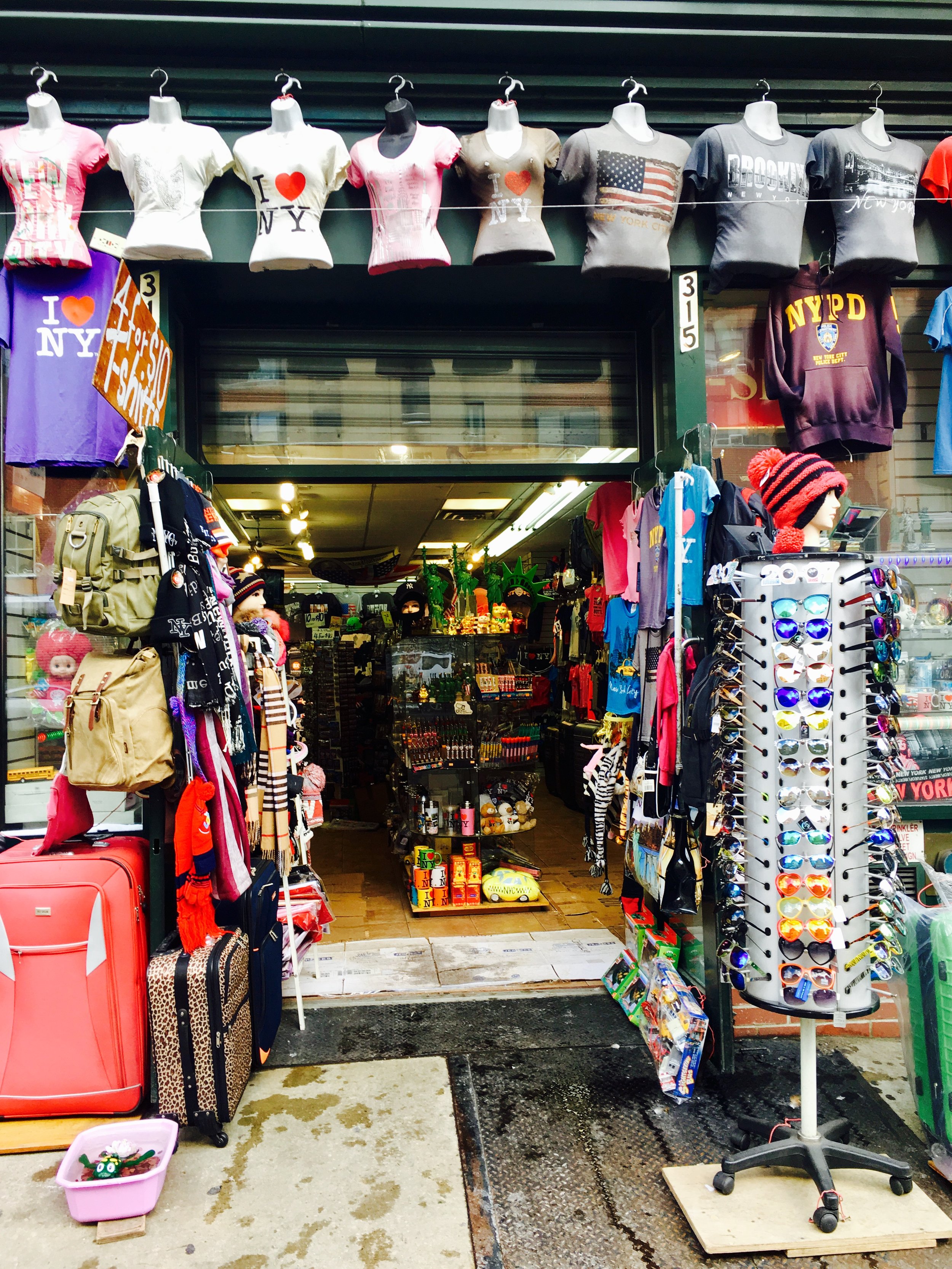 Street vendors on Canal Street selling imitation designer bags in