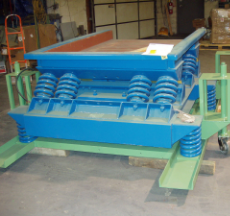 Vibrating table conveyor