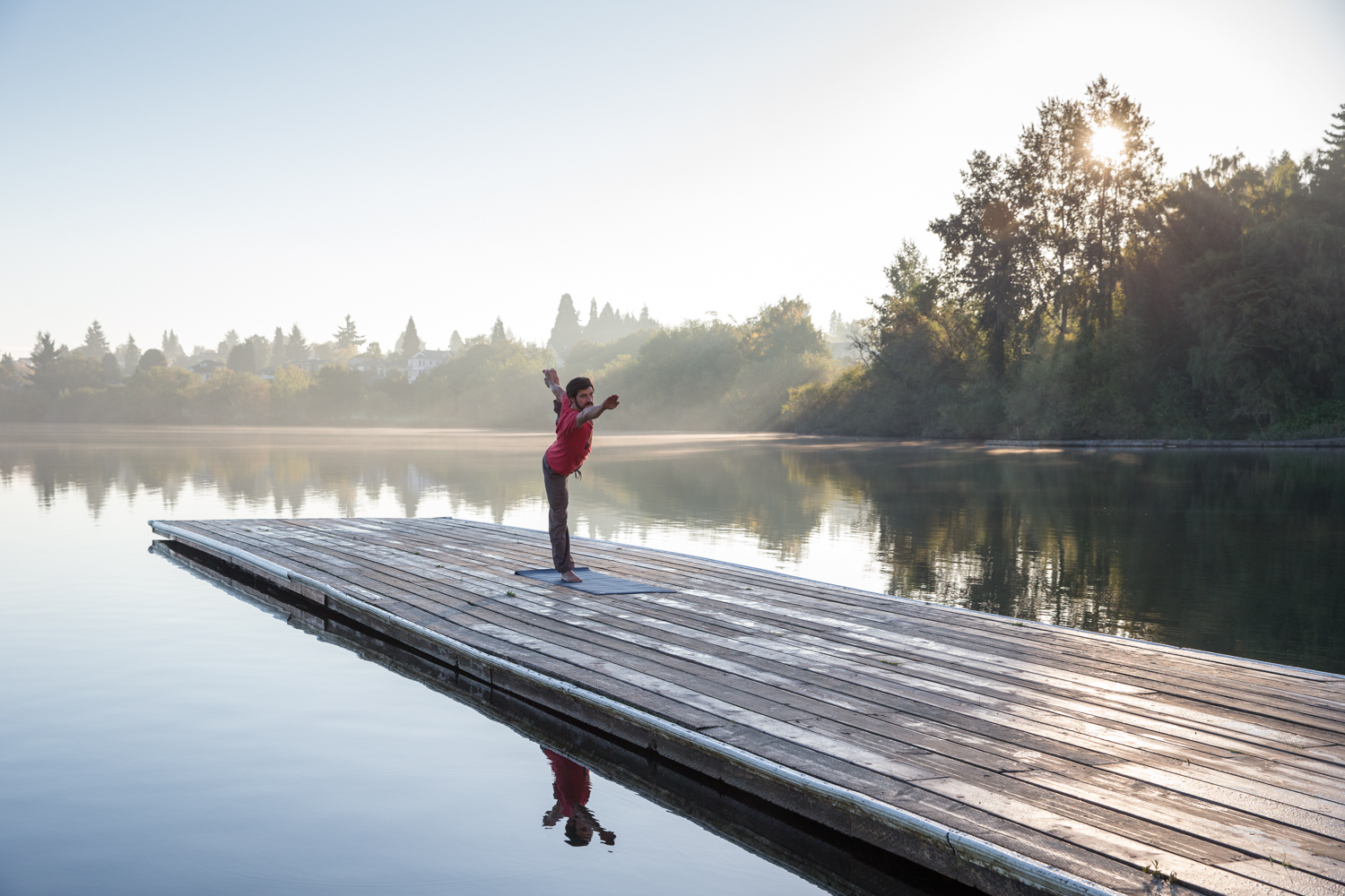  Scott Rinckenberger doing yoga at sunrise. Green Lake, WA 