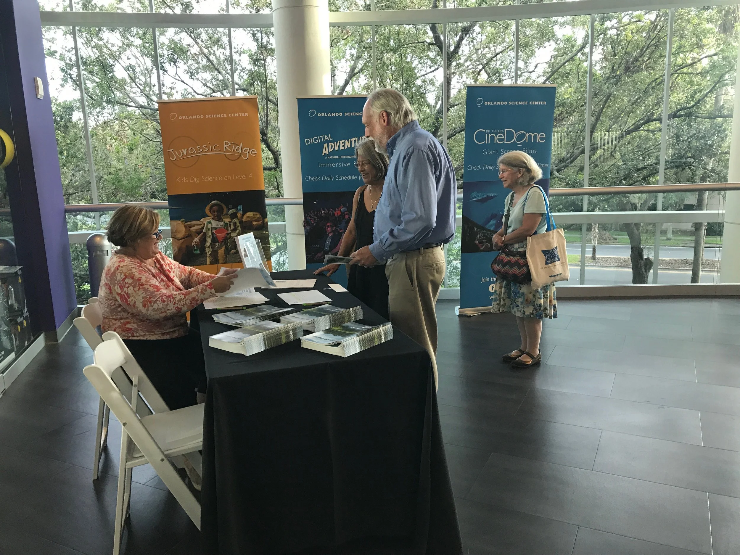 Volunteer Susan Burhoe welcoming our guests. Photo courtesy of CEJ Fellow Samantha Koempel.