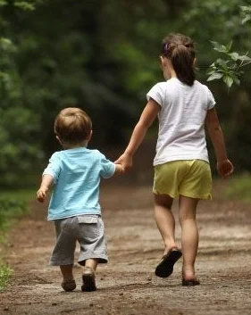 Siblings holding hands.jpg
