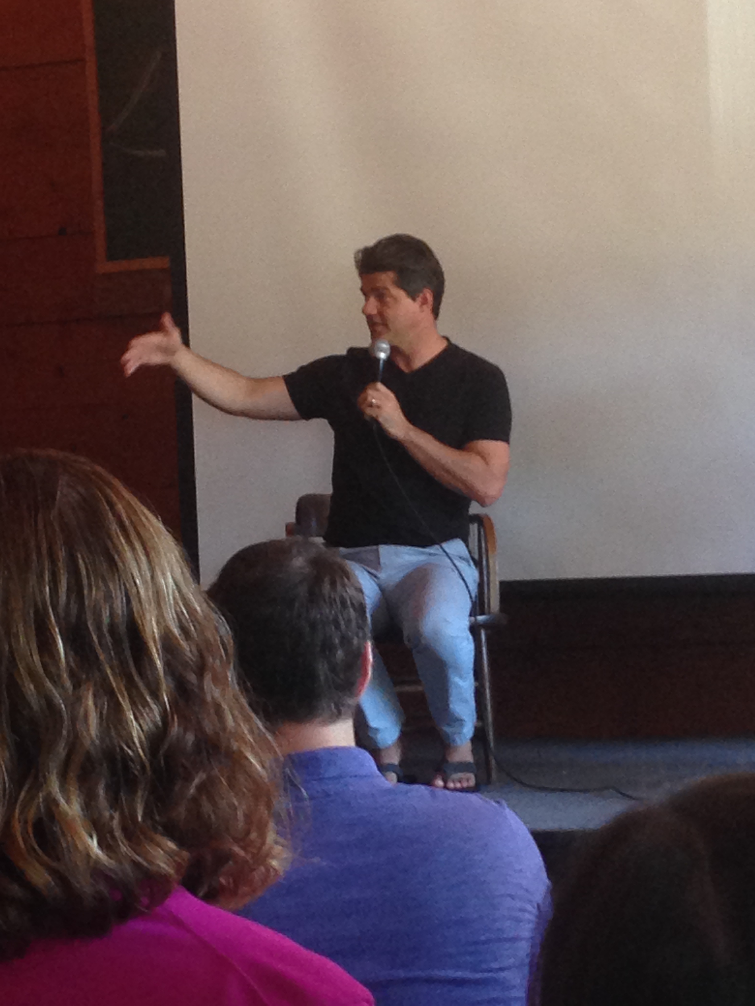 Joshua Becker captivates an audience at the Lucky Labrador in Portland, Oregon as he shares his family's journey into the world of Minimalism.