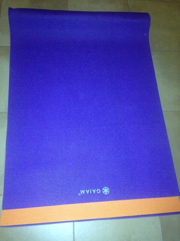 Fold the yoga fitness mat before rolling