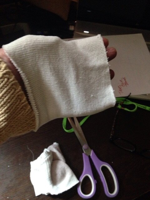 cut the sock to make a glove.jpg