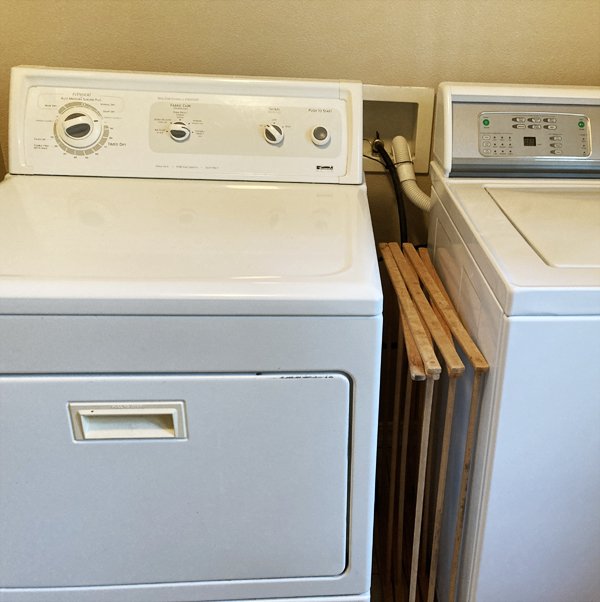 Tuck drying rack between machines