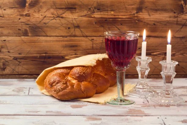 Shabbat Dinner wth Candles and Wine.jpg