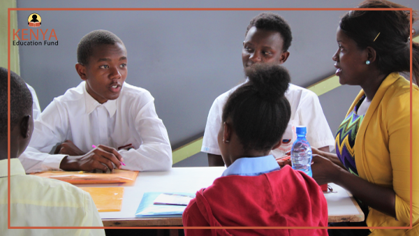 (Rosebella from Prudential Kenya engaging with students during a speed coaching session)