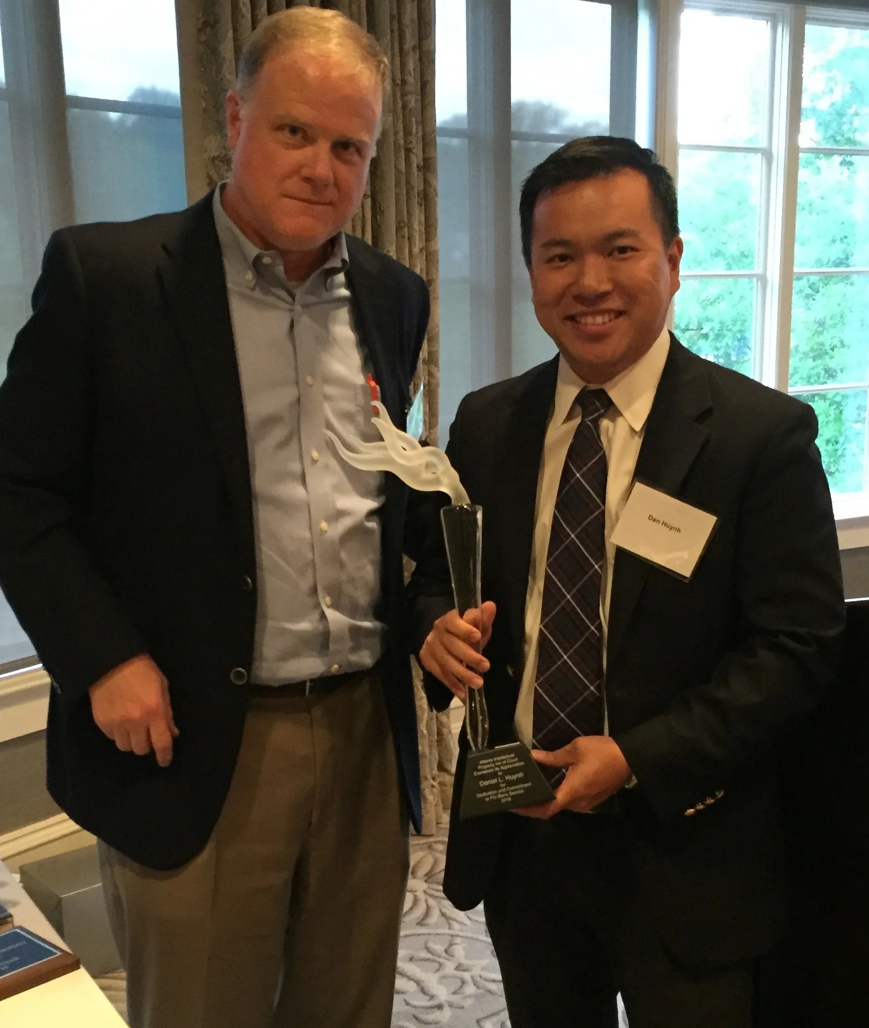 2016 Recipient Daniel Huynh (right) with Pro Bono Award Committee Coordinator, Frank Landgraff (left)