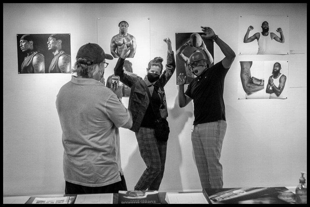 Charlie snapping pic of Lou & Mark celebrating Gallery Show.jpg