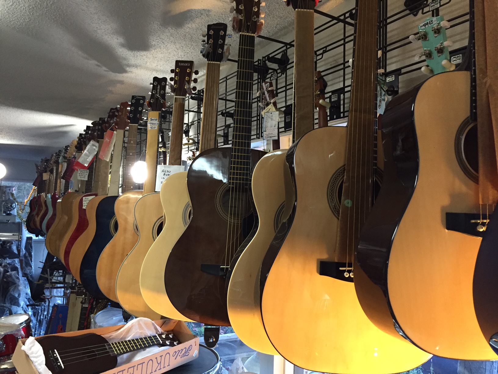 Stop by A.L.M.A and pick out a new acoustic or electric guitar, or maybe a junior drum set and a series of lessons to get them started!