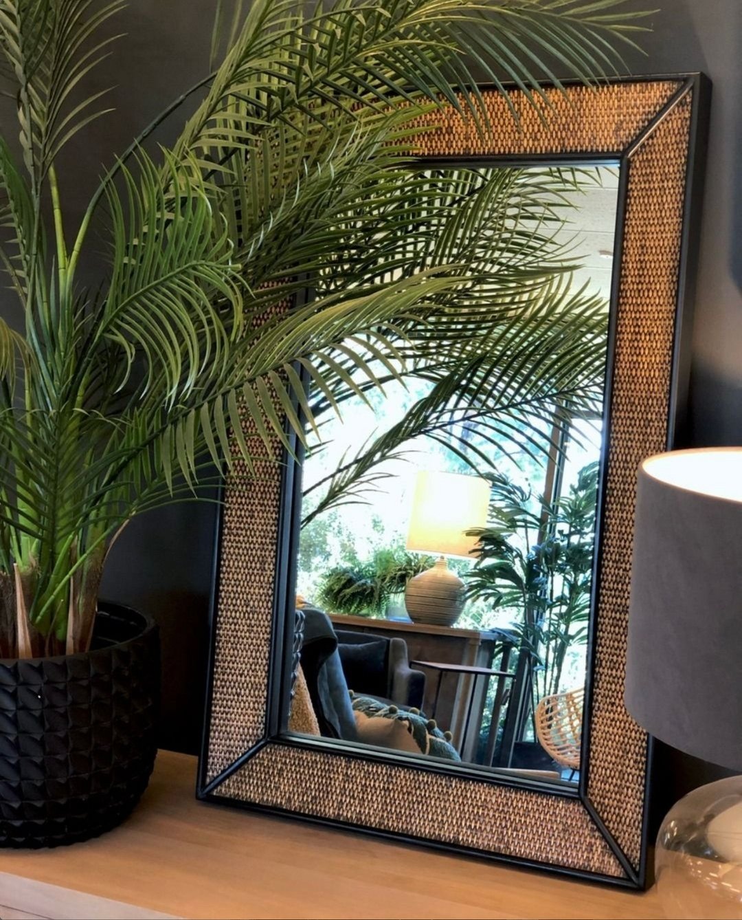 Inspired by the British Colonial style with a modern edge the Raffles Rectangular Mirror Black has been crafted with a solid white cedar wood frame painted black. Hand-woven natural rattan inserts add another layer of high-end style while adding text