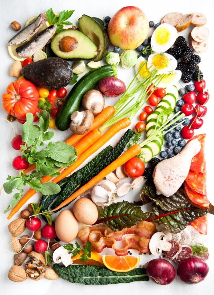 Veggies, meats, a little fruit, and nuts and seeds. Have at 'er!