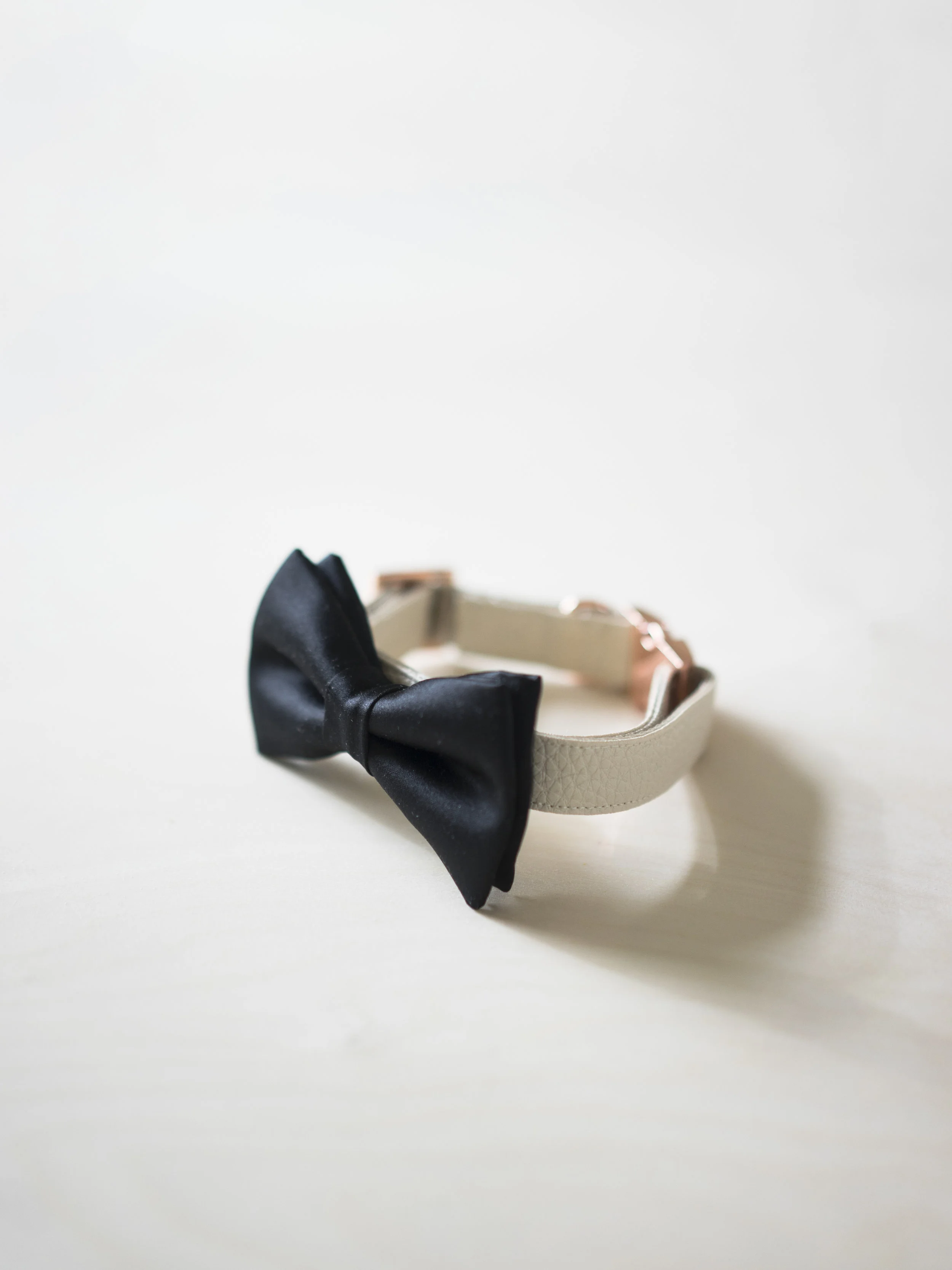 black satin dog bow tie with cream vegan leather dog collar