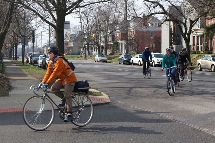 A trainee practices leading a How We Roll ride through the University District. 