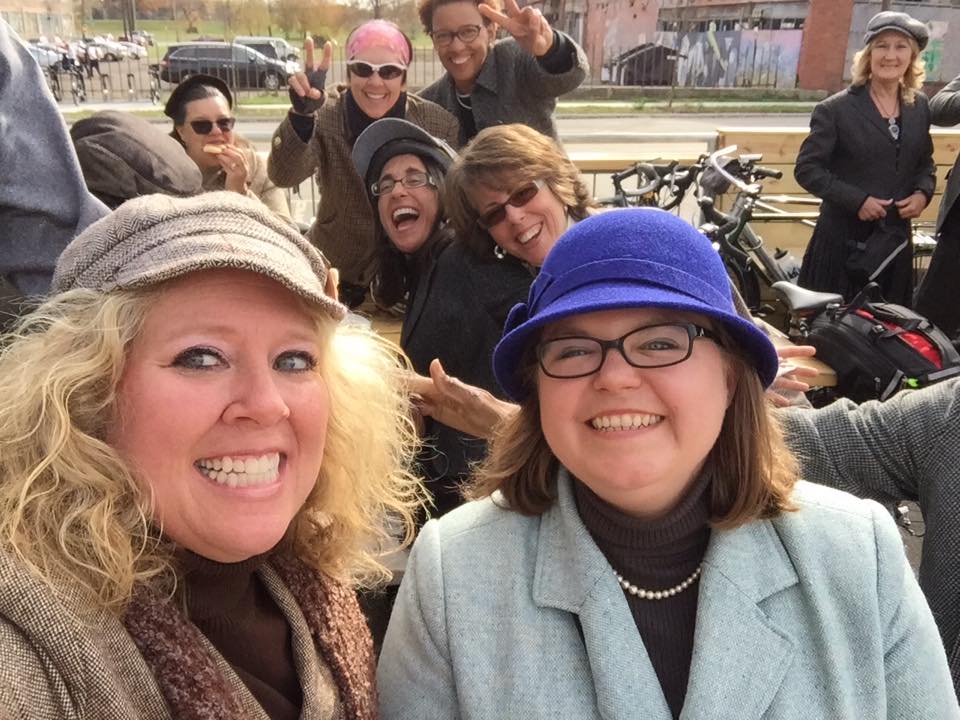 Rockin' a purple hat, with friends, on a recent Tweed Ride. 