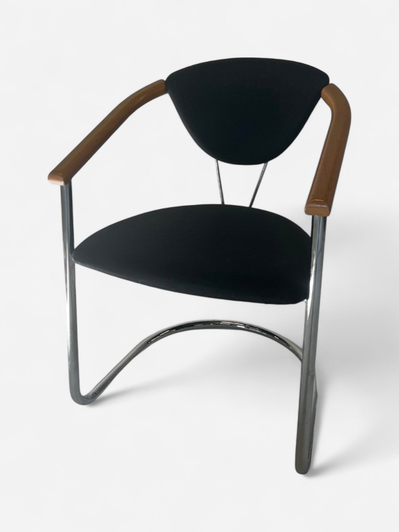 UPHOLSTERED CANTILEVER CHAIR