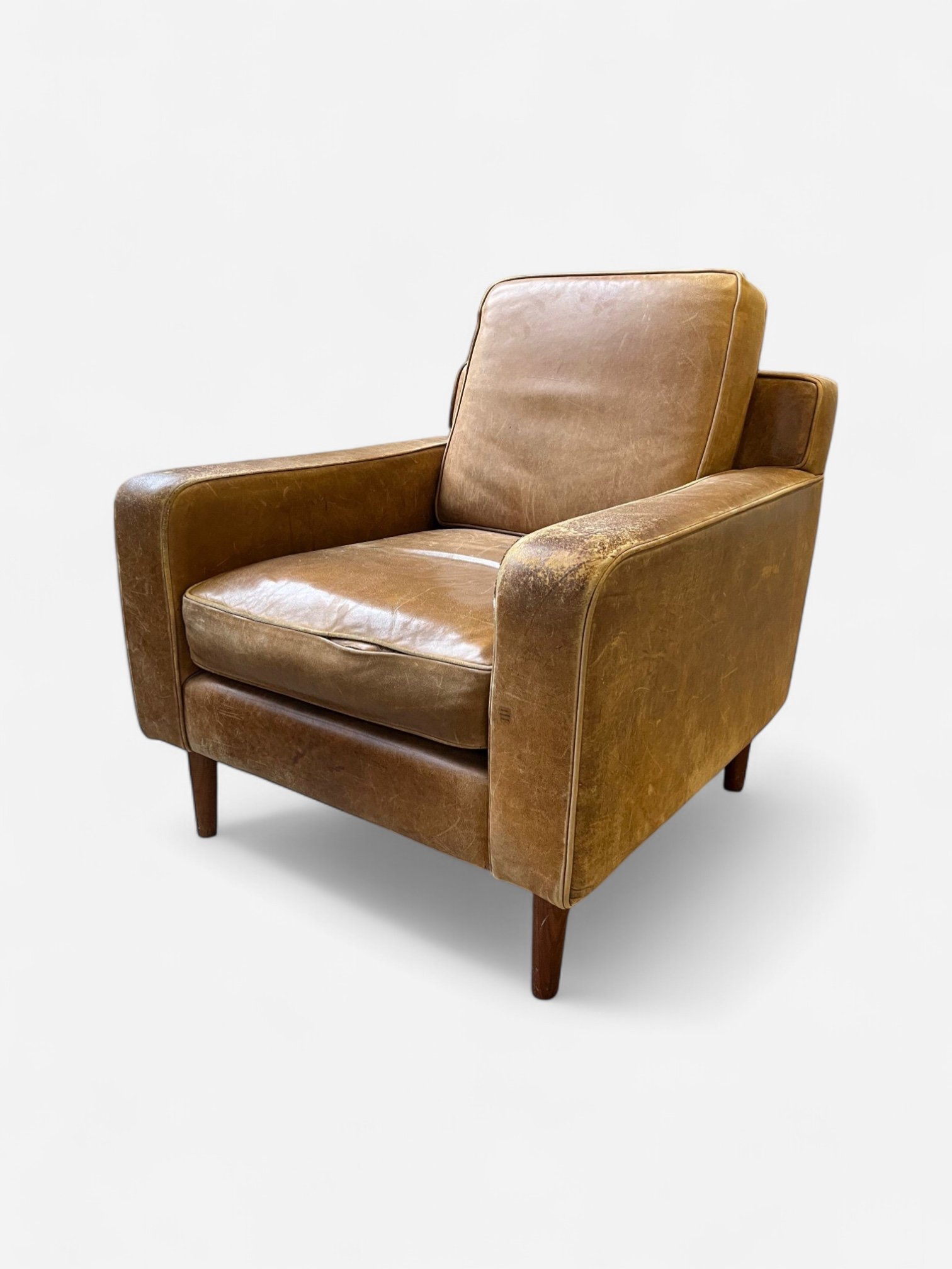 DISTRESSED LEATHER LOUNGE CHAIR