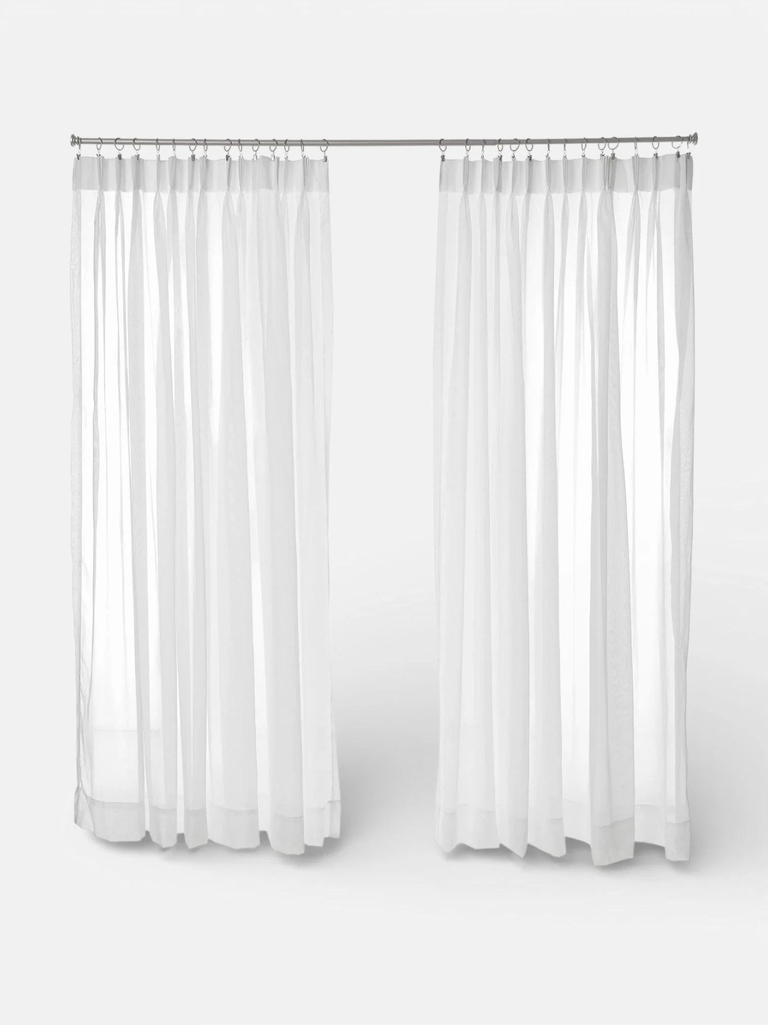PAIR OF PINCH PLEATED SHEER WHITE DRAPES (48”W x 84”L)