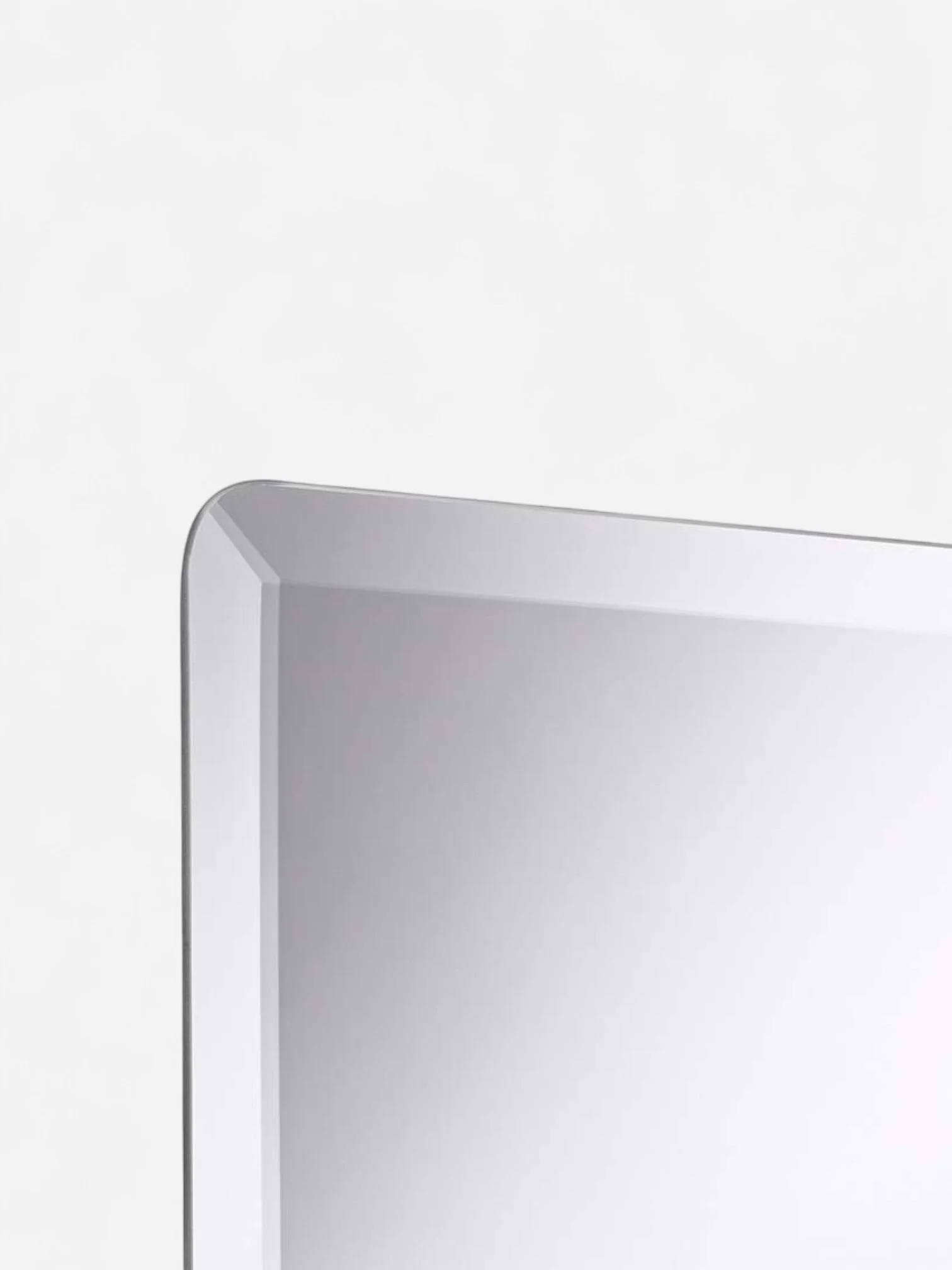 galvin-24-inch-x-36-inch-modern-frameless-beveled-wall-mirror__p1400views1-Photoroom.jpg