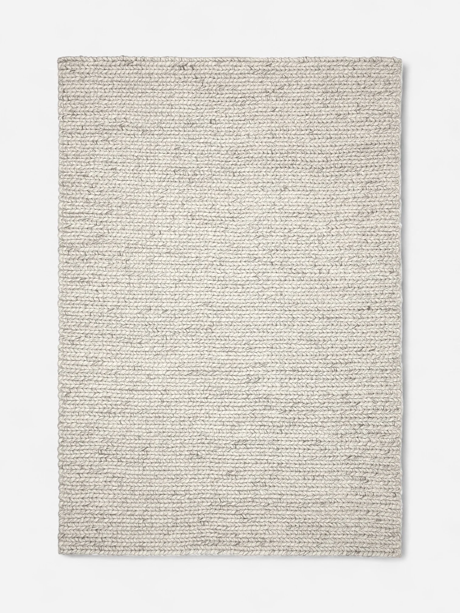 WOVEN CREAM RUG (5'3" x 7'7")