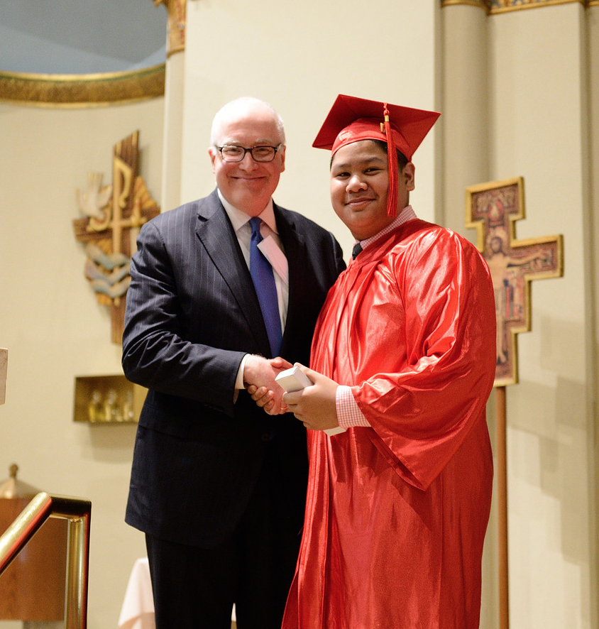 Christopher Kelly presenting Gerardo Garcia with the 2017 Mary Claire Bonner Award