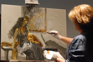 After 10 minutes with the hair dryer, I began glazing with a palette of three completely transparent acrylic paints. They were Golden Fluid Acrylics: Quinacridone Gold, Quinacridone Crimson, and Turquoise. I talked about how the old masters glazed (often over months) using a similar technique. I started with the warmest colour first using Quinacridone Gold as my yellow....