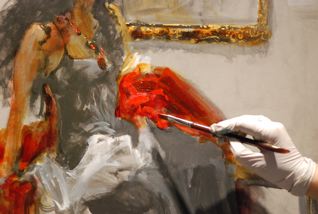 Then I glazed red over those areas that represented the red robe, taking care to do it in thin glazes, rather than slapping on the crimson. Note previously applied yellow gives a warmer red. I added thin, transparent layers of red to the frame. Notice how very transparent the Golden colours are, achieving a baroque-looking frame with just a few strokes!
