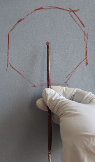 Skull Measurement Mark: Using warm, thin paint, loosly sketch a circle for the skull ball, then place a small mark (used as a measuring device)