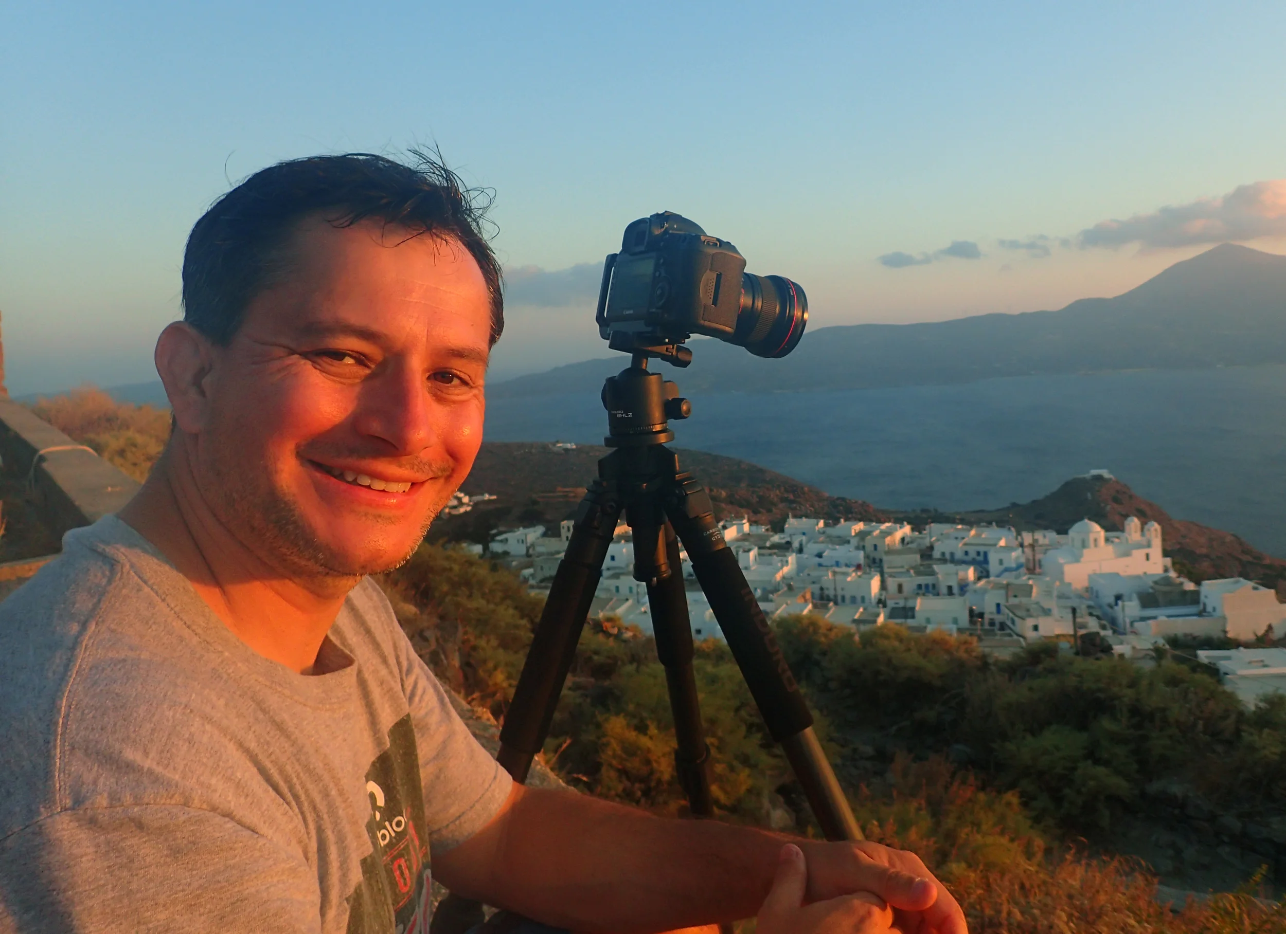 Yours truly while enjoying a wonderful sunset in the island of Milos, Greece.