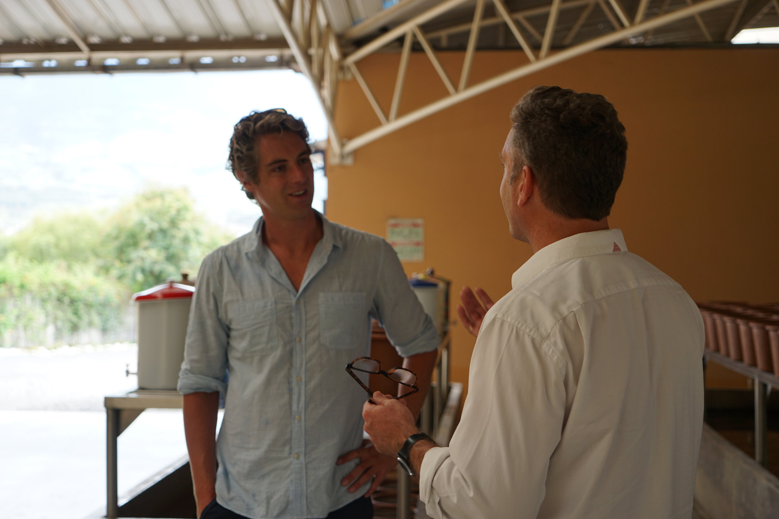 Dom with EcoFiltro Founder Phillip Wilson at the company's factory outside Antigua City, Guatemala 