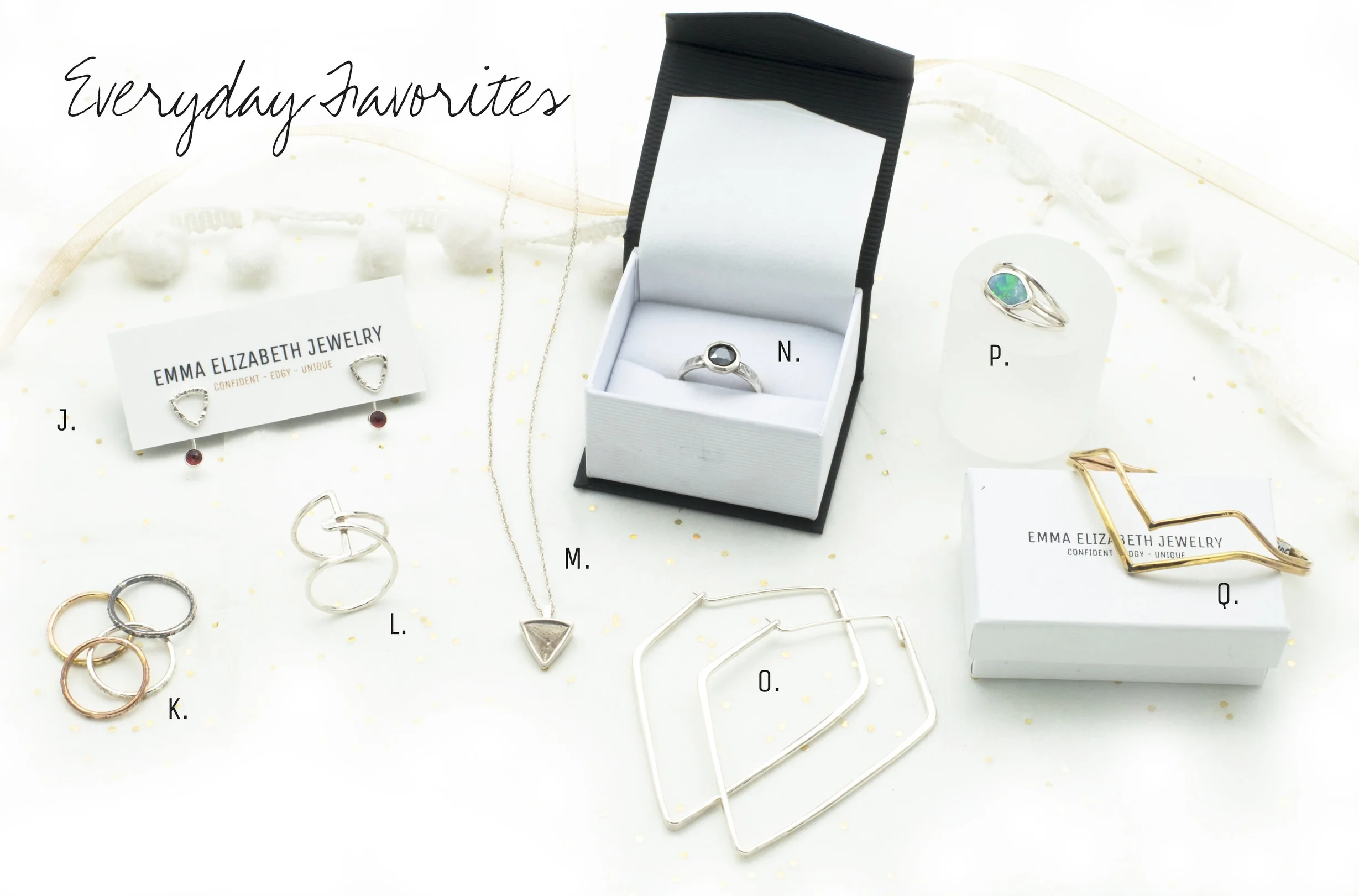 J. Studs and Gemstone Earring Jackets $105 K. Textured Stacking Rings $25+ L. Geometric Wrap Ring $75 M. Geometric Triangle Necklace $90 N. Hematite Stacking Ring $145 O. Angular Hoop Earrings $125 P. Opal Fire Ring $145+ Q. Elegant Angled Cuff $105