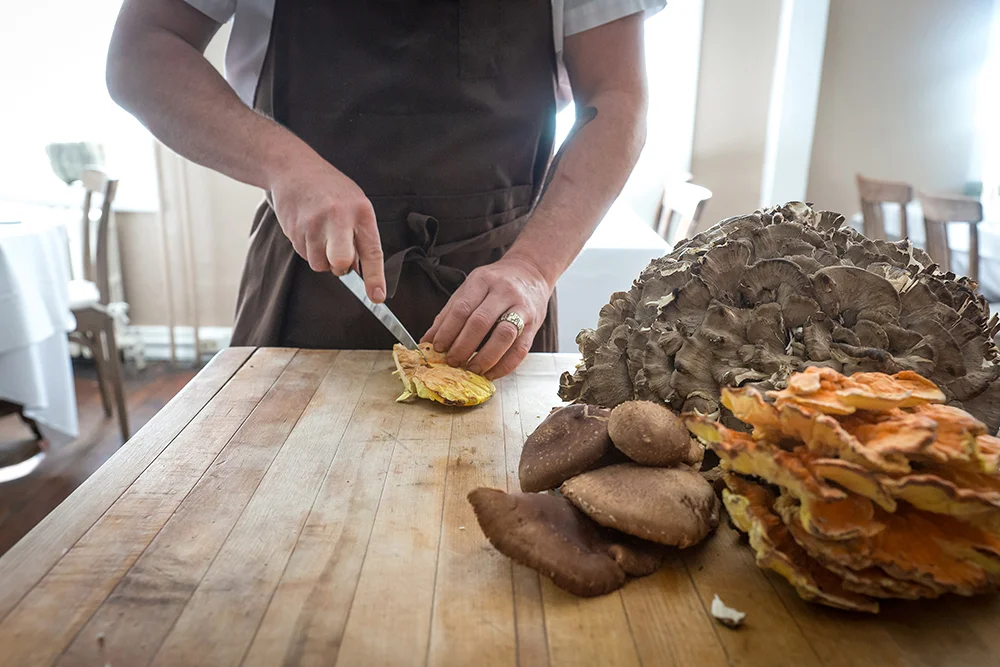 Chef prep at Bolete with foraged mushrooms