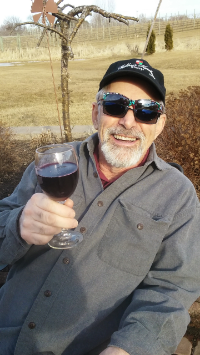 The Glass is Half Full. (Also nice sun glasses.)