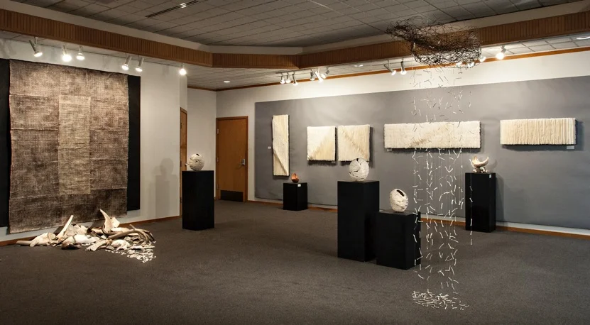 Installation view Tears for the World 2014 Orcas Center Gallery, Orcas Island, WA Shorelife/Ebbtide , (left, on floor) Tears for the World 2014 fired clay, found wire object, string (right, suspended from ceiling)