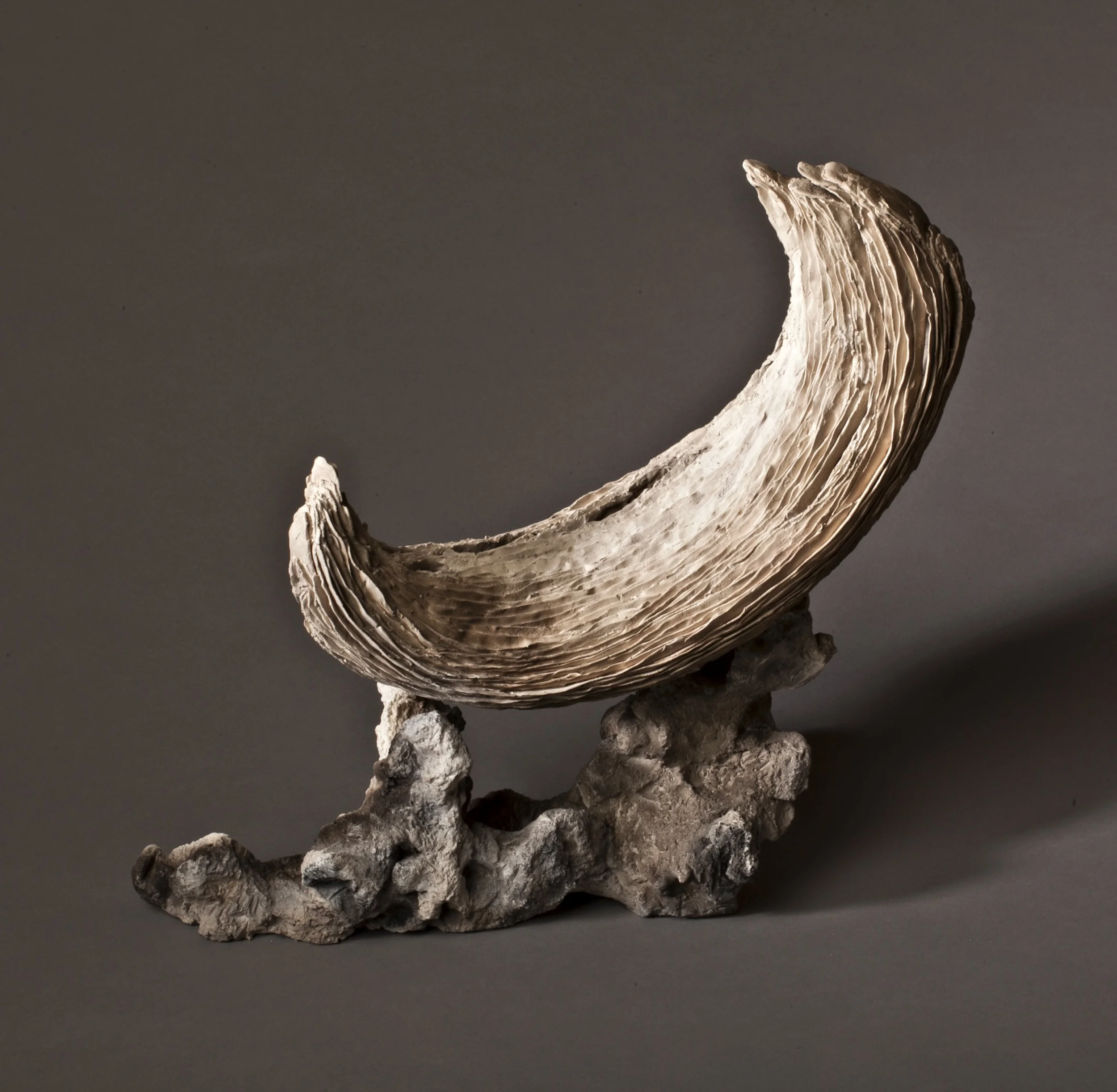 Serene Crescent 2012 clay, kiln- and pit-fired variable, c. 12”h. x 6” x 12”