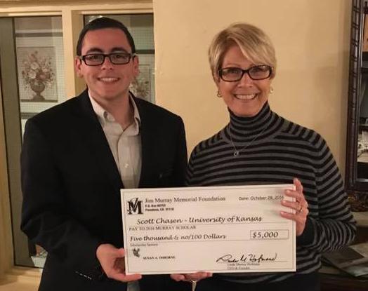 Scott Chasen accepted his award for excellence in sports writing from Linda McCoy-Murray, CEO and founder of the Jim Murray Memorial Foundation scholarship.