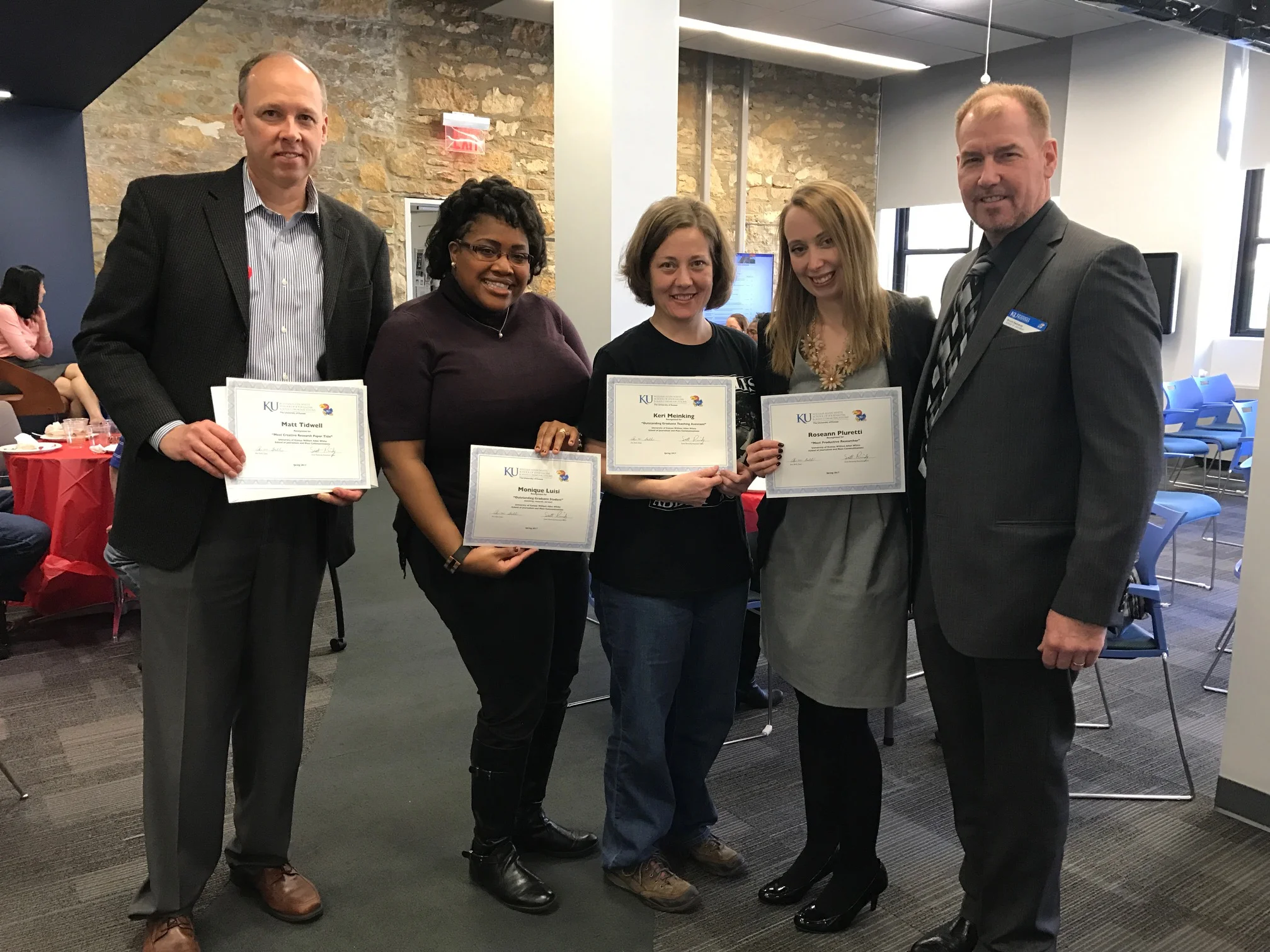 J-School graduate students were recognized April 3-7 during Graduate Student Appreciation Week, and the following students won awards: (from left) Matt Tidwell, Monique Luisi, Keri Meinking and Roseann Pluretti with Associate Dean Scott Reinardy . Not pictured: Husain Ebrahim