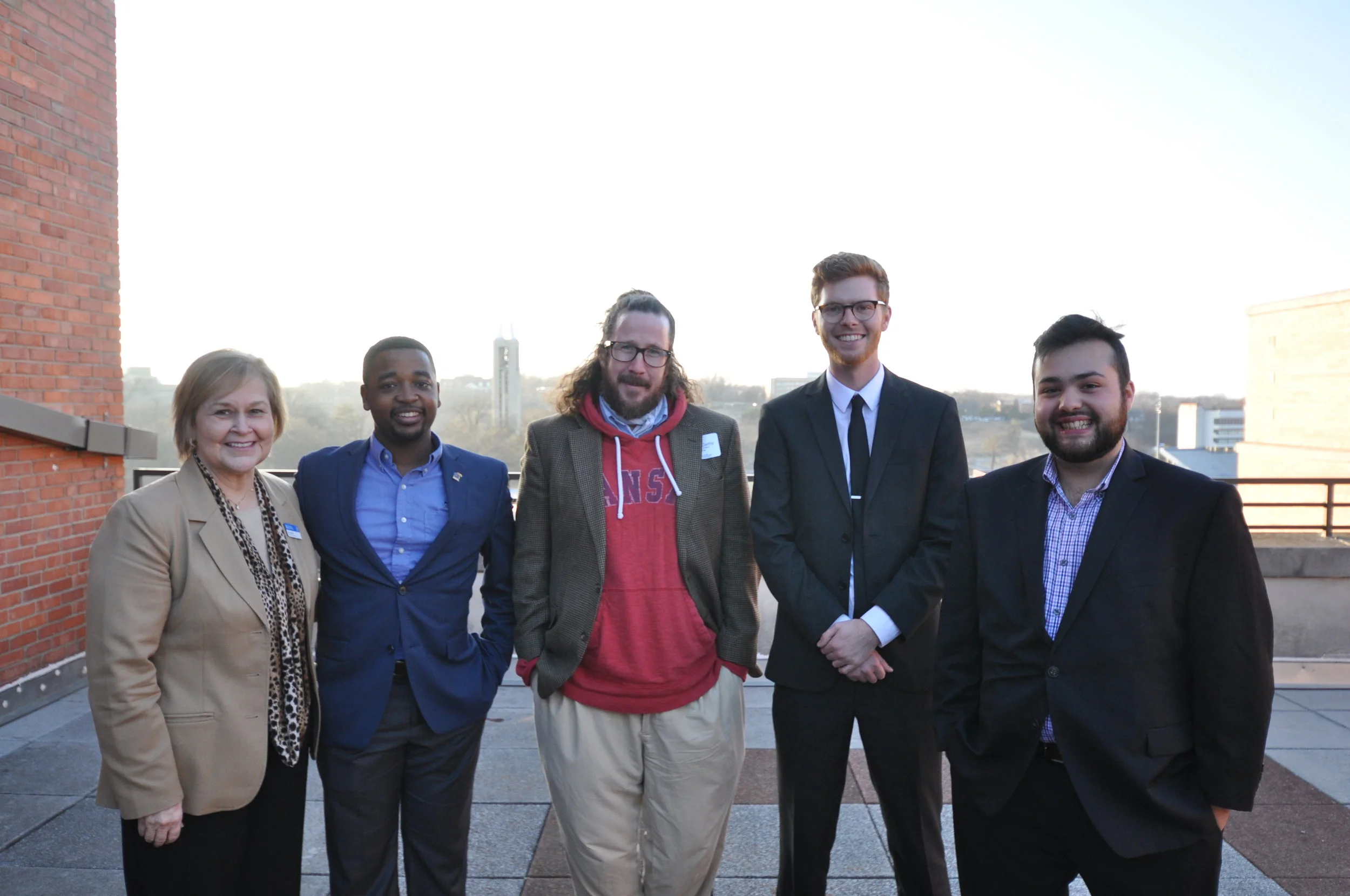 Dean Ann Brill with (from left) Joshua Robinson, Dan McCarthy, Sam Eastes and Juan Pablo Marroquin.