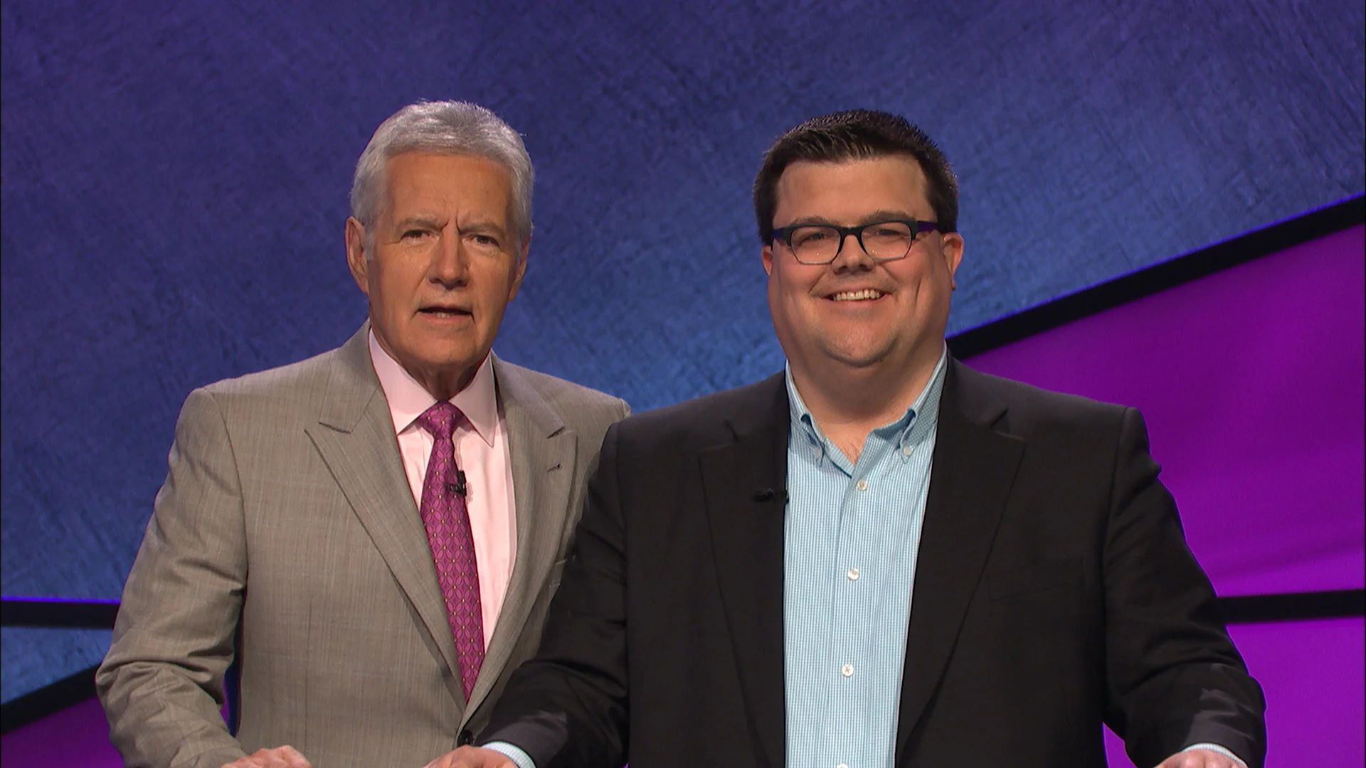 Alex Trebek (left) with J-School alumnus Andy Hyland.