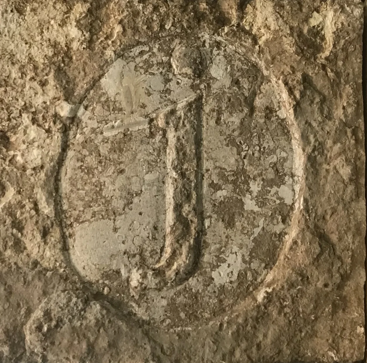 The cornerstone piece of tile at the JBar is stamped with the JBar's signature logo.