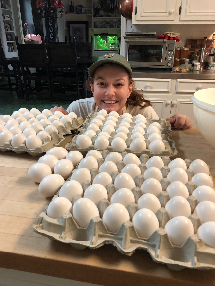 Sarah Kate marveling at the 96 eggs she was about to crack. Truly making these pies for her has been an exercise in arithmetic and arthritis.