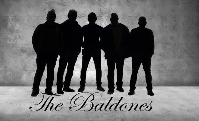 The Baldones, led by DYC member Rob Mazow, play the upper deck