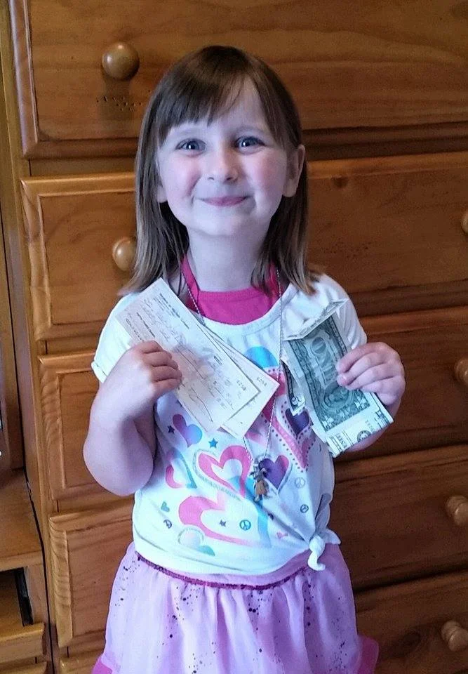 Rachel collected money for the Haiti 323 Project at her 5th birthday party!