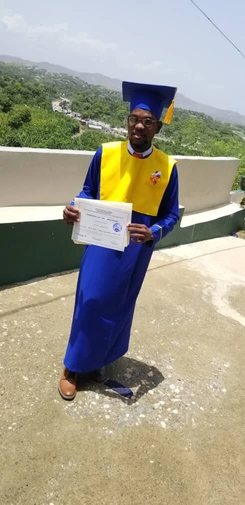 Guerby_with_diploma.jpg