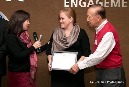 Charlotte Danielsson receiving Board Member of the year award from the APIA Public Affairs Assocation for her commitment to APIA empowerment