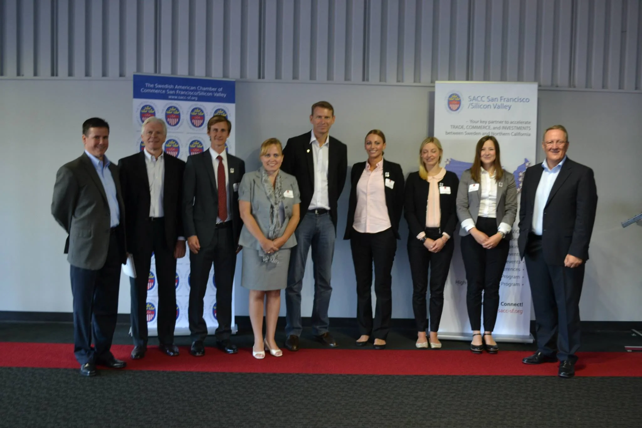 Charlotte Danielsson with Tesla employees and SKF CEO