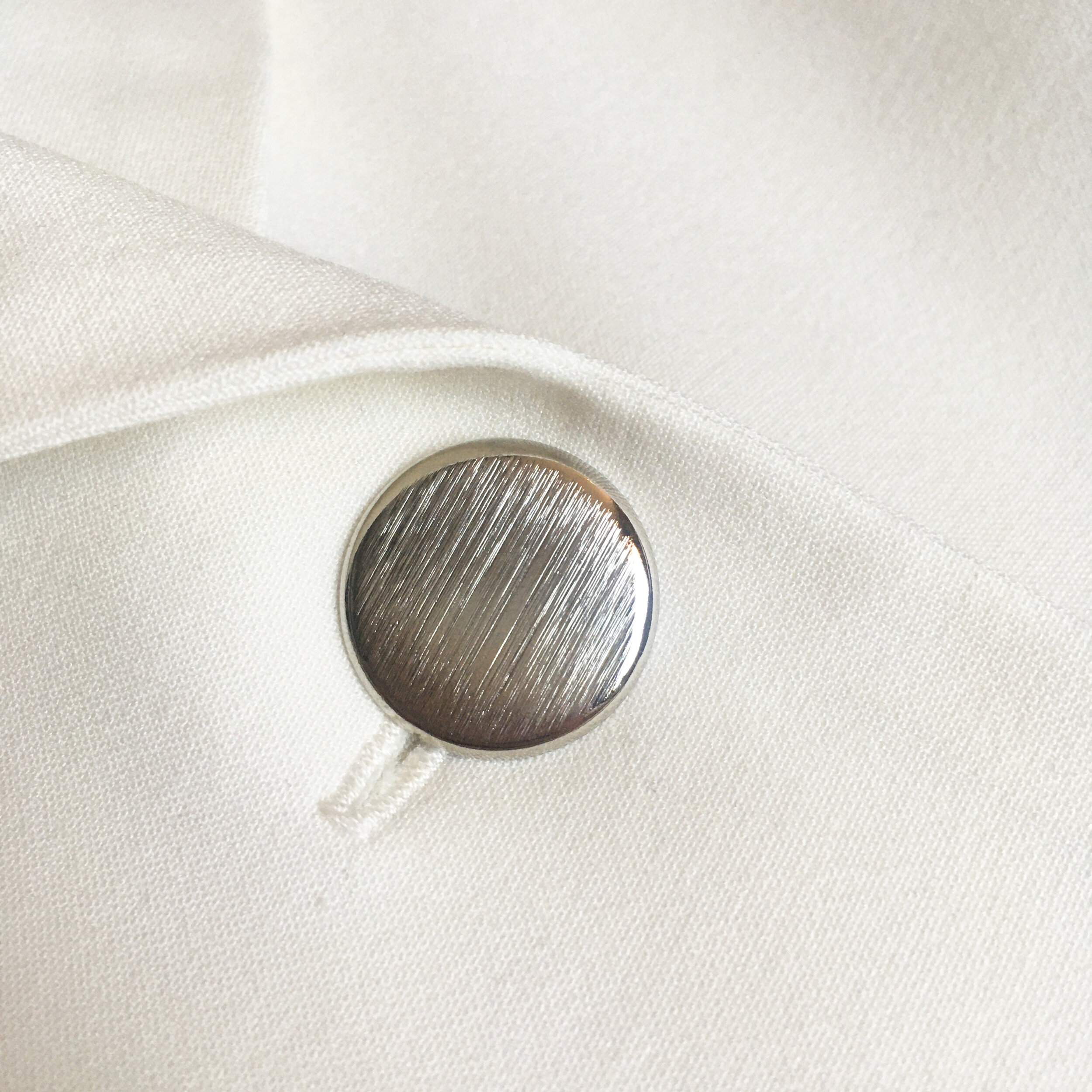 Bilancia Waistcoat Ivory Silver Shimmer Metal Button Detail Shot.JPG